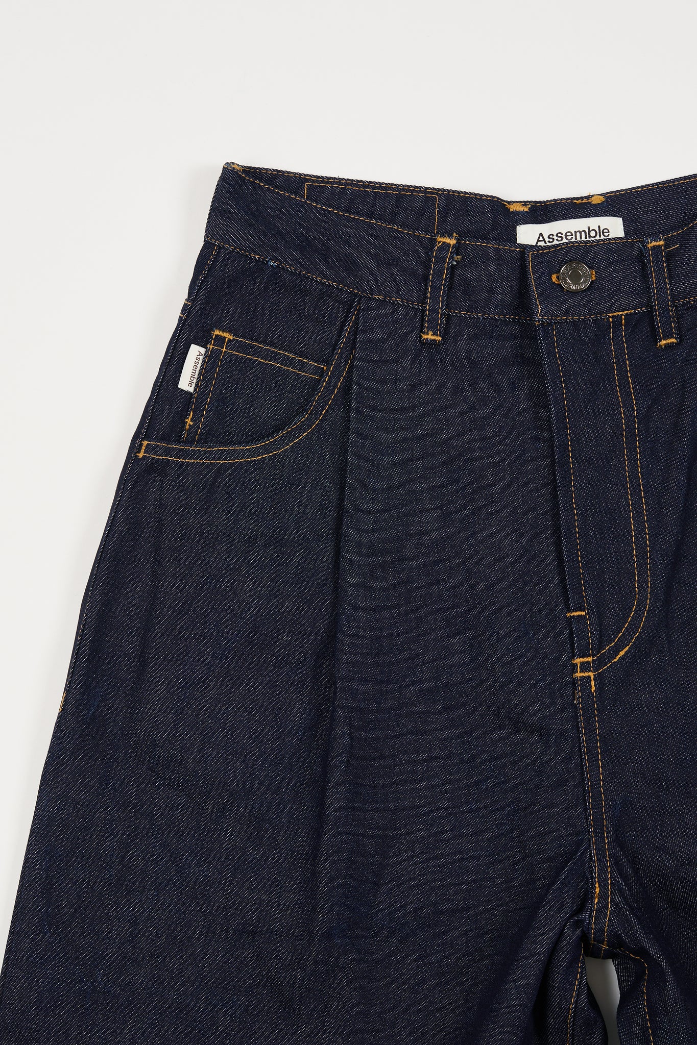 Assemble denim shorts details